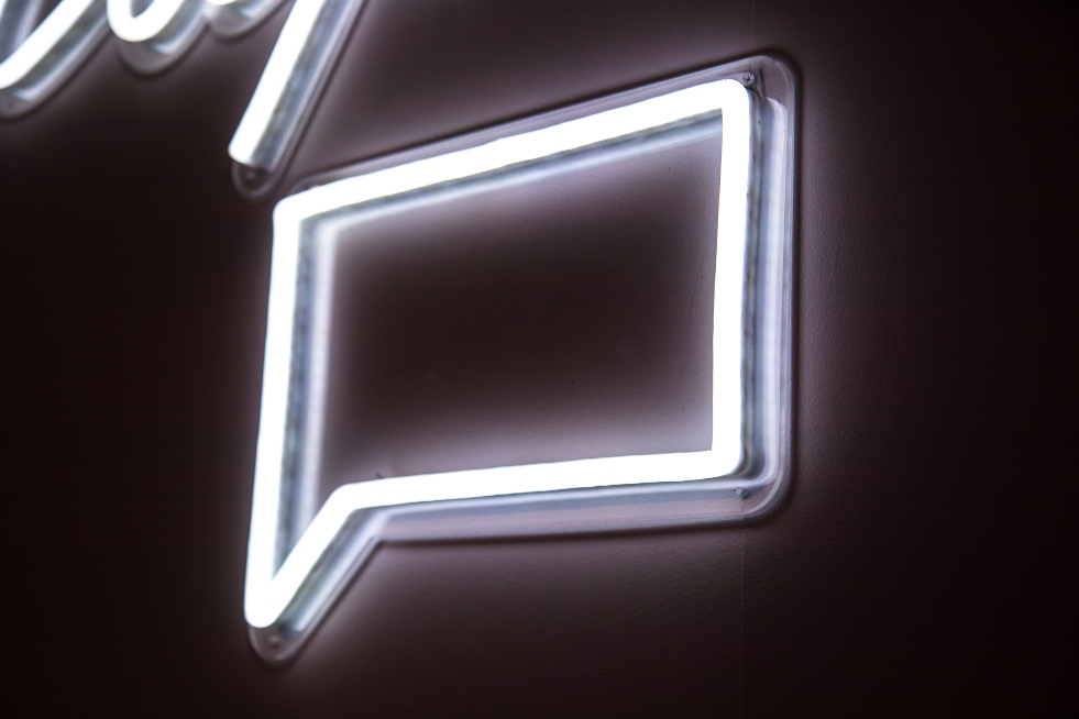 message-in-neon-white-sign