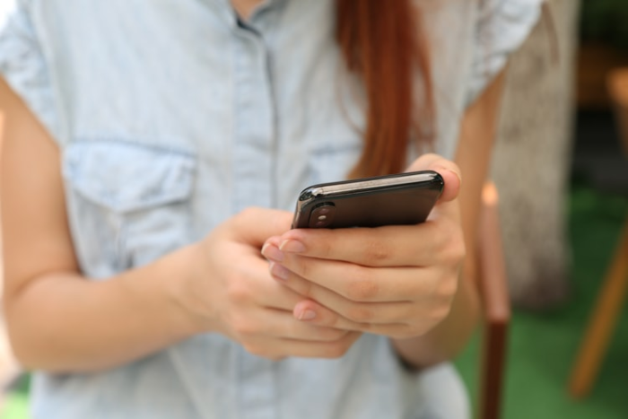 person holding cell phone