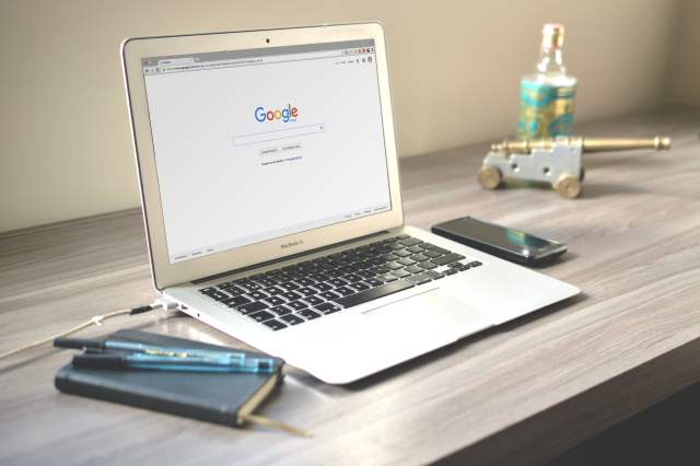 laptop displaying google search engine