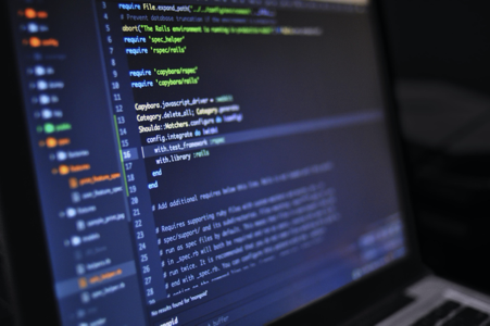 Photo of computer screen with code displayed
