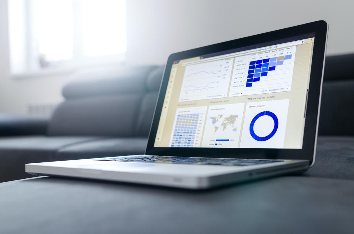 Stock photo of a laptop displaying graphs
