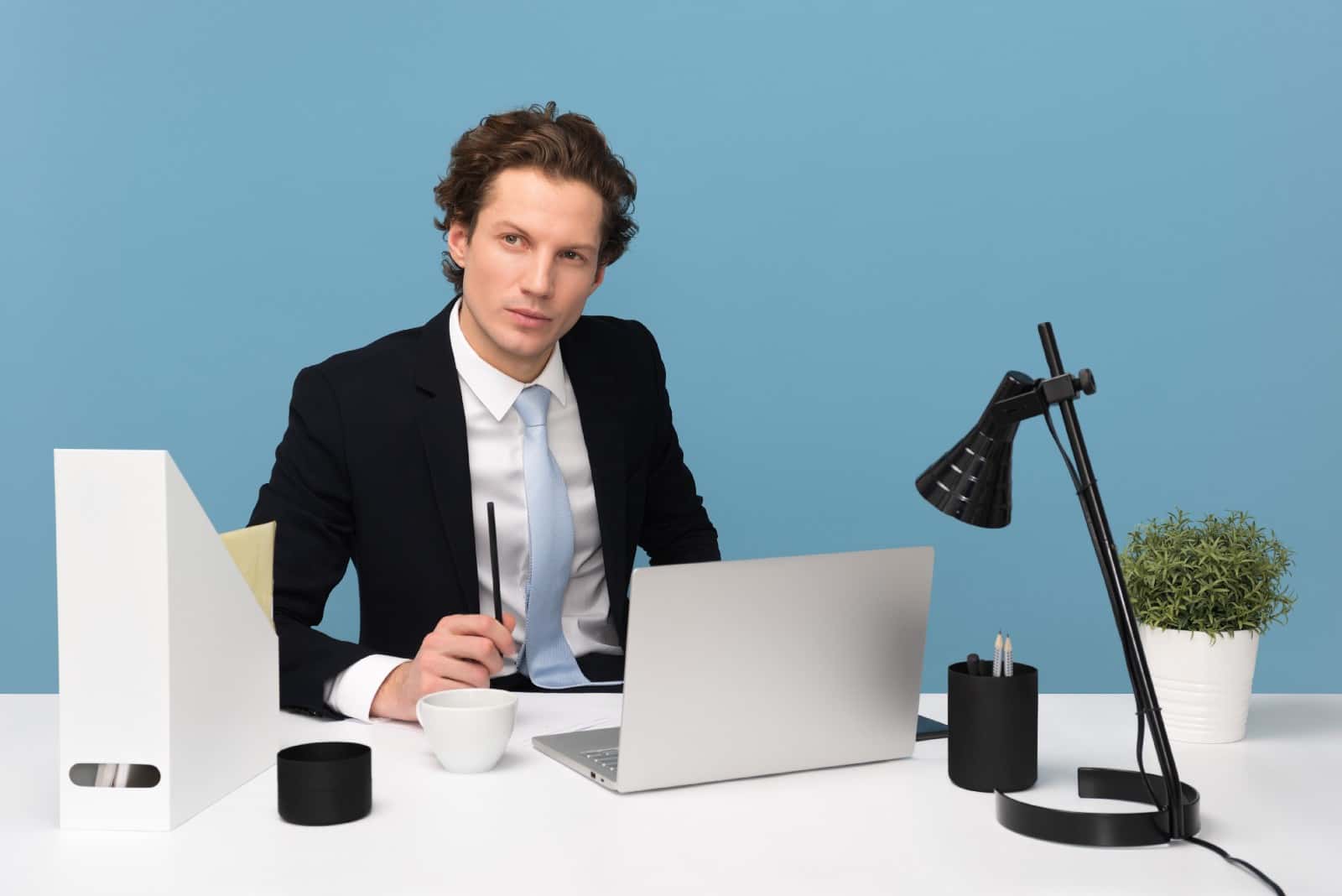 Manager at desk thinking about new strategy
