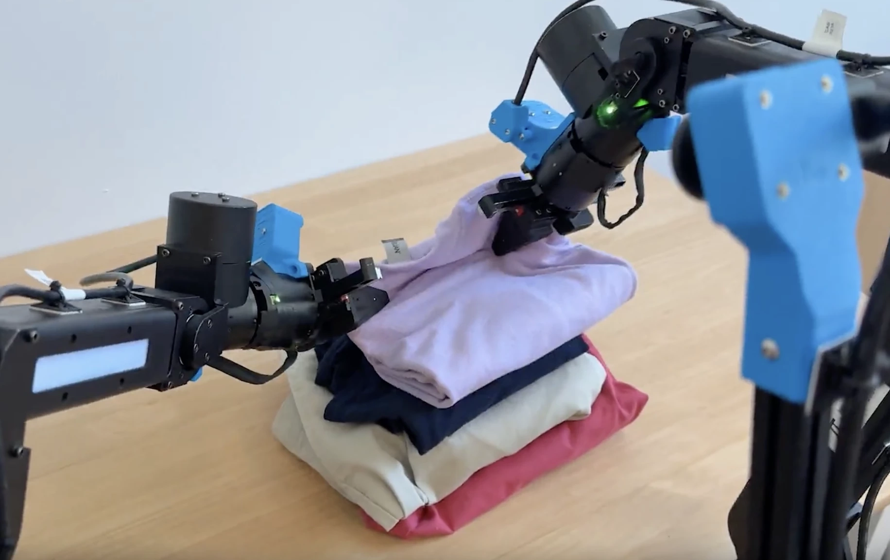 VLA powering Pi0’s robot to fold laundry